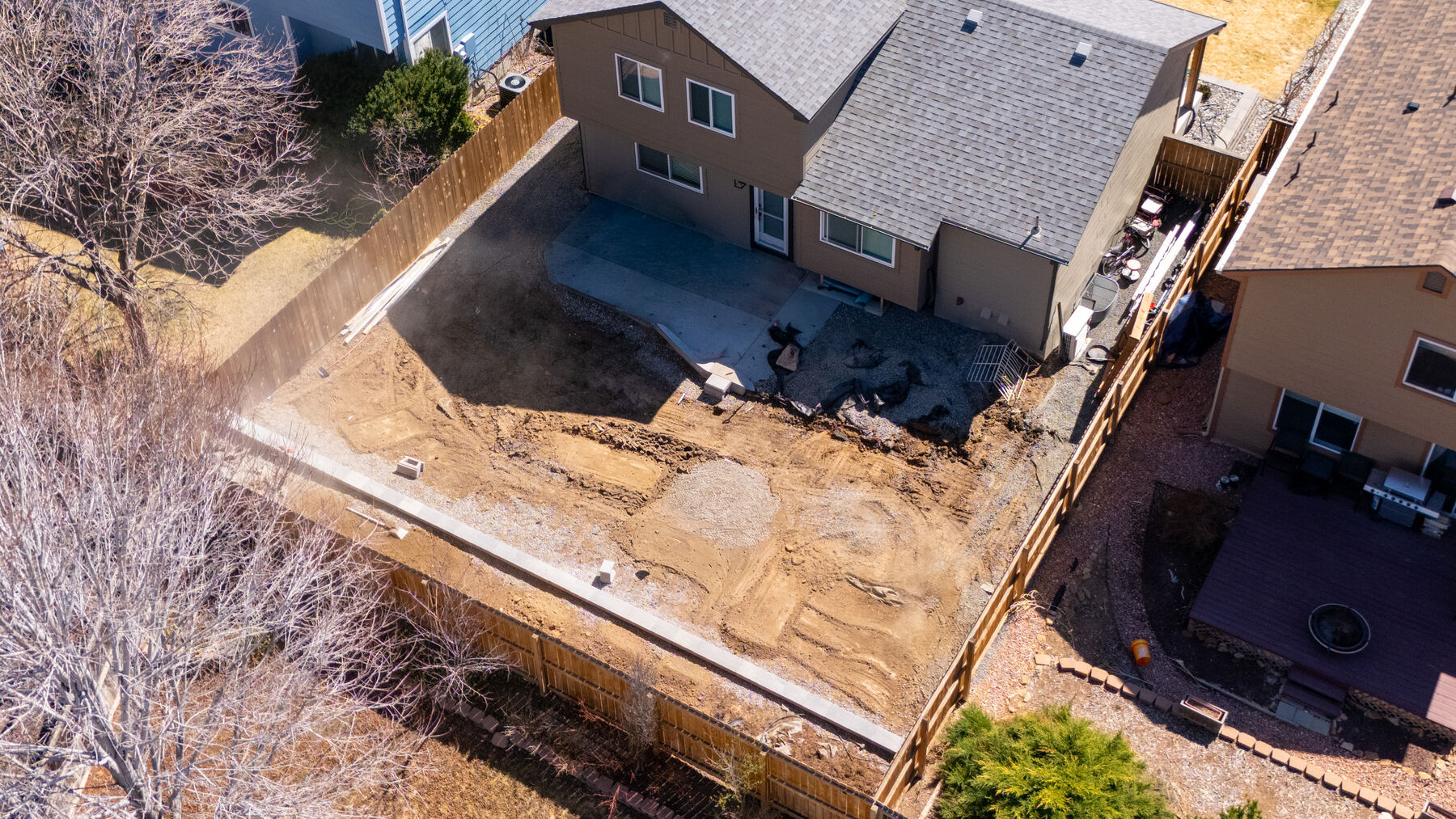 Backyard excavation and grading in progress, from above