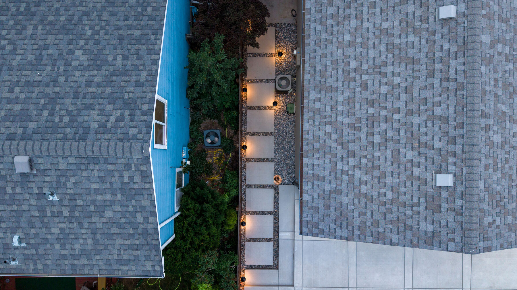 Paver walkway and landscape lighting from above