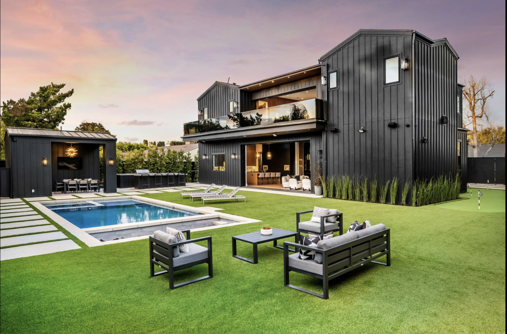 Modern outdoor living space at dusk