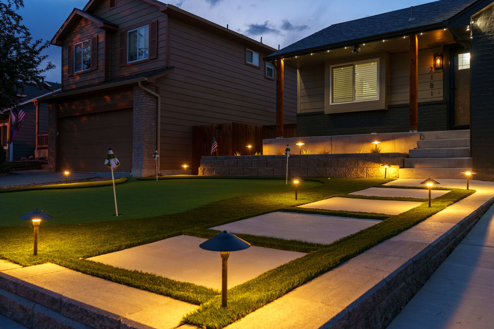 Stacked stone retaining wall with lighting